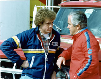 Rusty Wallace and Roger Penske talk strategy in 1980.