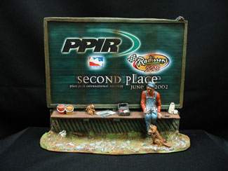 The first and second place trophies from the 2002 Pikes Peak INDYCAR race.