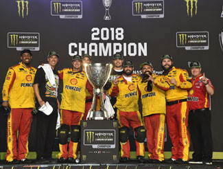 As a member of the 2018 Cup Series Champion No. 22 Ford team, Conklin (right of the trophy) has been to the mountaintop with Team Penske.